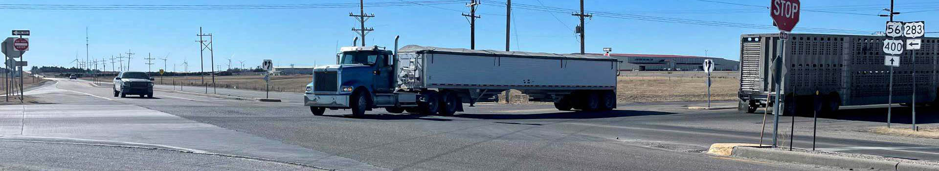 Road Intersection in Dodge City with Semi