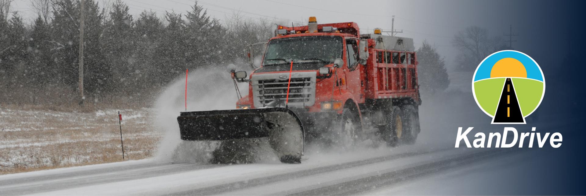 Snowplow on roads with KanDrive logo